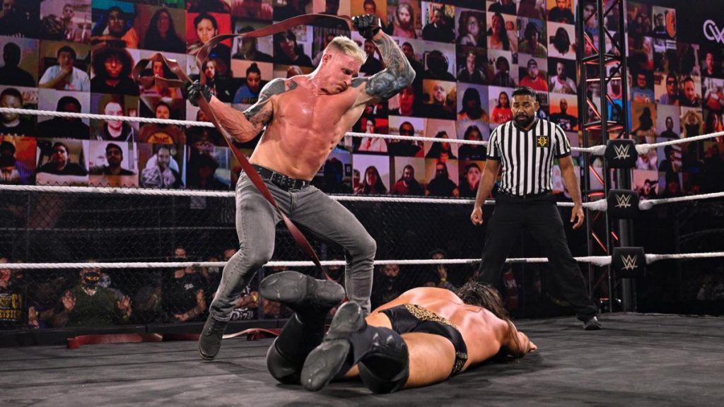 Dexter Lumis whips Cameron Grimes with the strap match strap