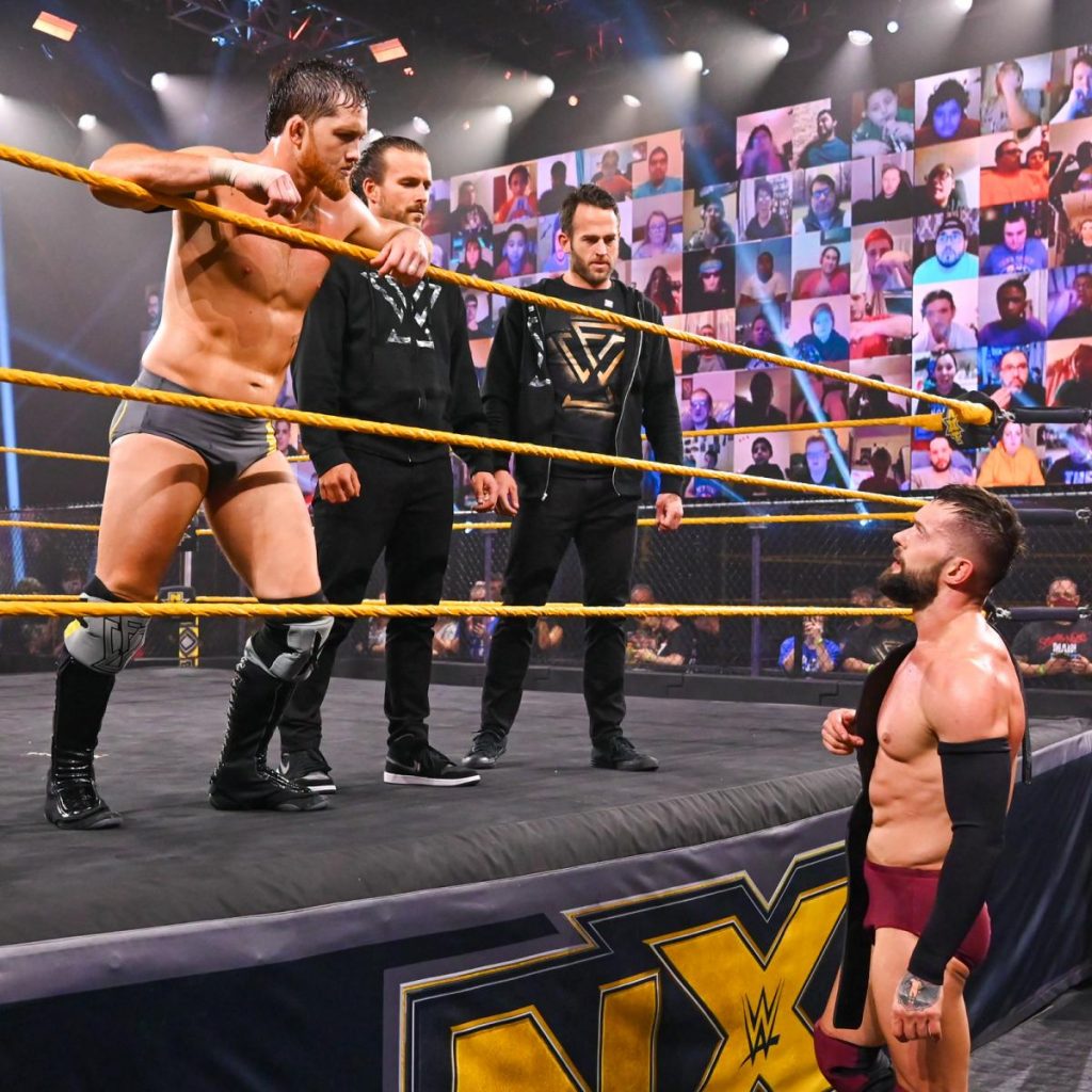 Undisputed ERA and Finn Balor stare each other down