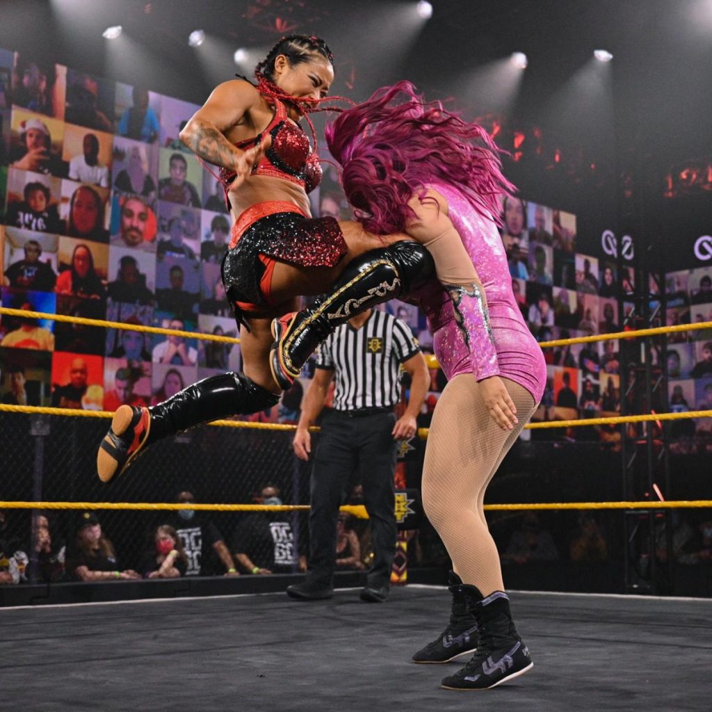 Xia Li knees Katrina Cortez in the face.