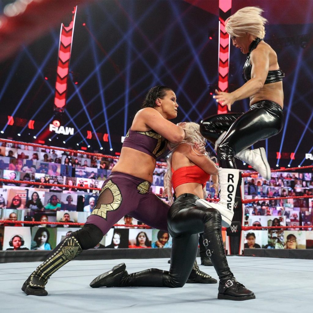 Mandy Rose knees Shayna Baszler in the face to make her let go of Dana Brooke