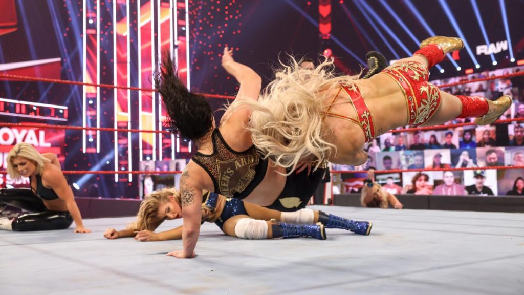 Charlotte Flair spears Shayna Baszler