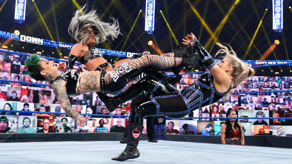 The Riott Squad double dropkick Natalya