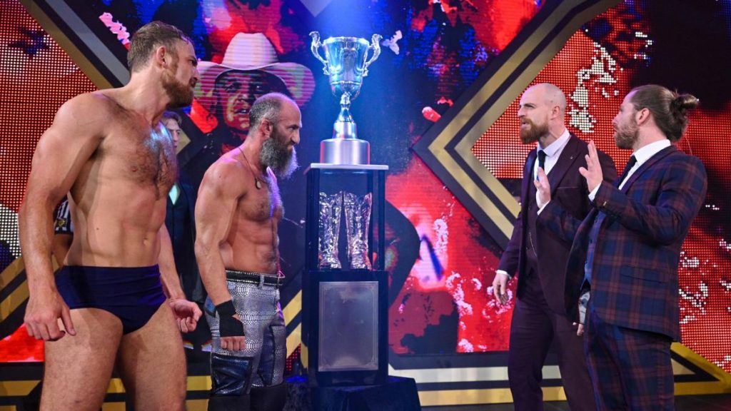 Tommaso Ciampa and Timothy Thatcher face off with Grizzled Young Veterans on either side of the Dusty Cup