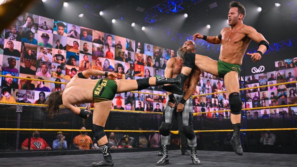 Undisputed ERA double team Tommaso Ciampa with a kick and a knee