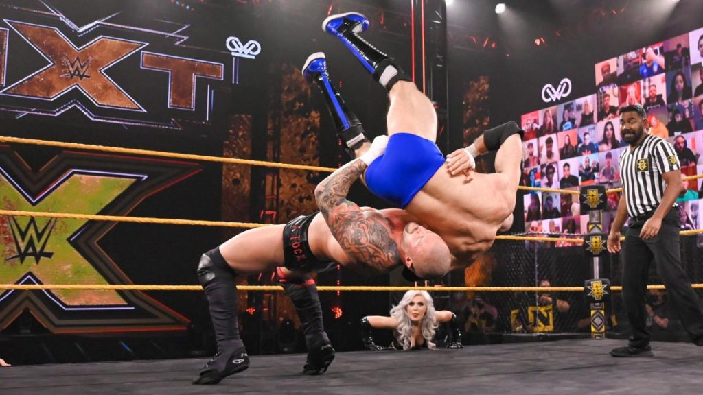 Karrion Kross suplexes Oney Lorcan