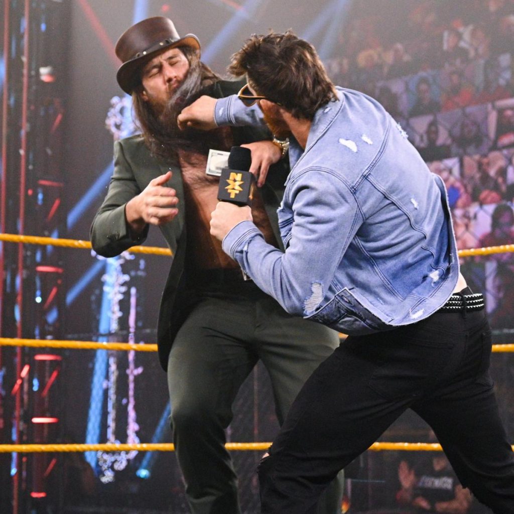 Kyle O'Reilly punches Cameron Grimes in the face