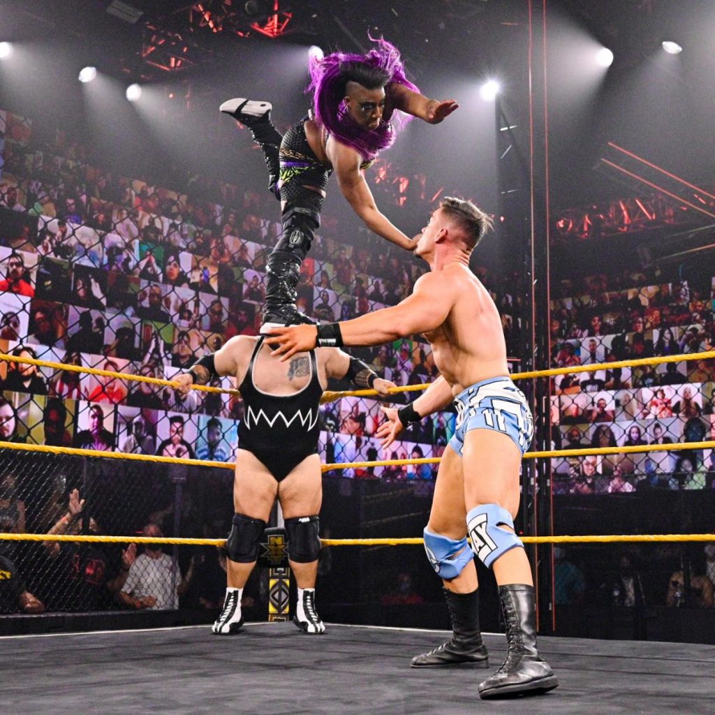 Ember Moon delivers the Eclipse to Austin Theory off Bronson Reed