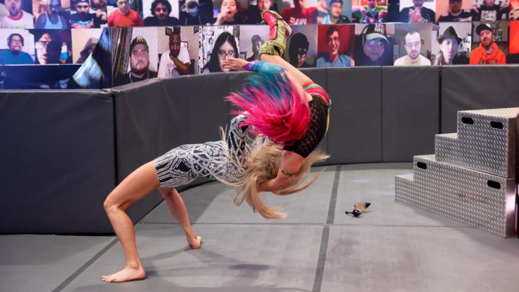 Charlotte Flair suplexes Natalya