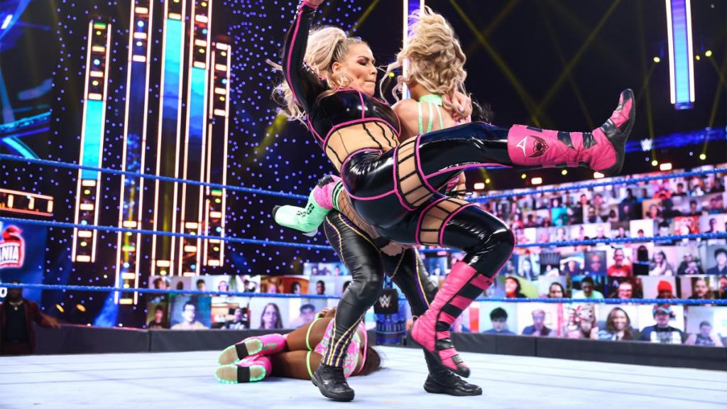 Natalya takes down Lana at the end of the tag brawl