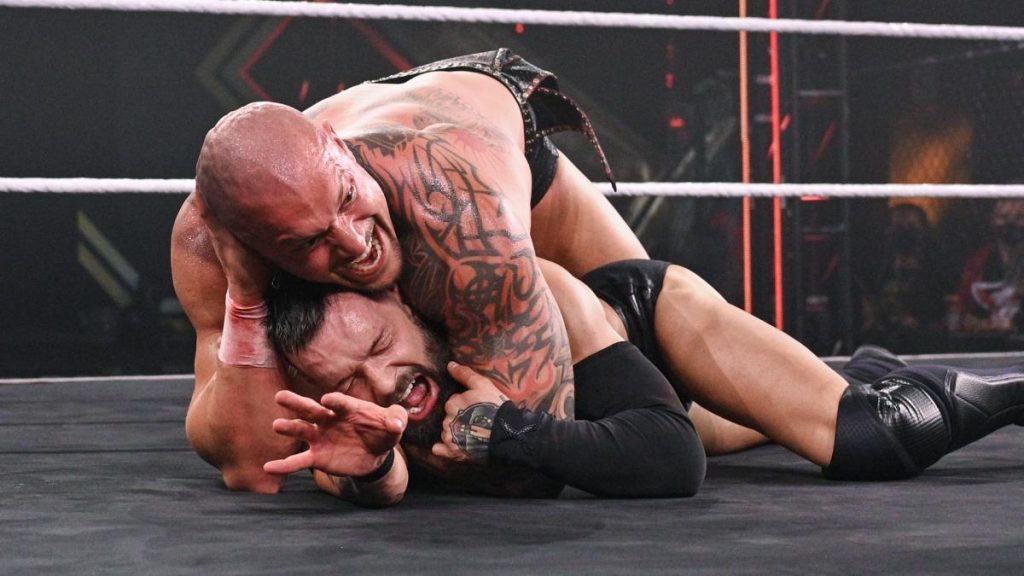 Karrion Kross tries to put Finn Balor to sleep