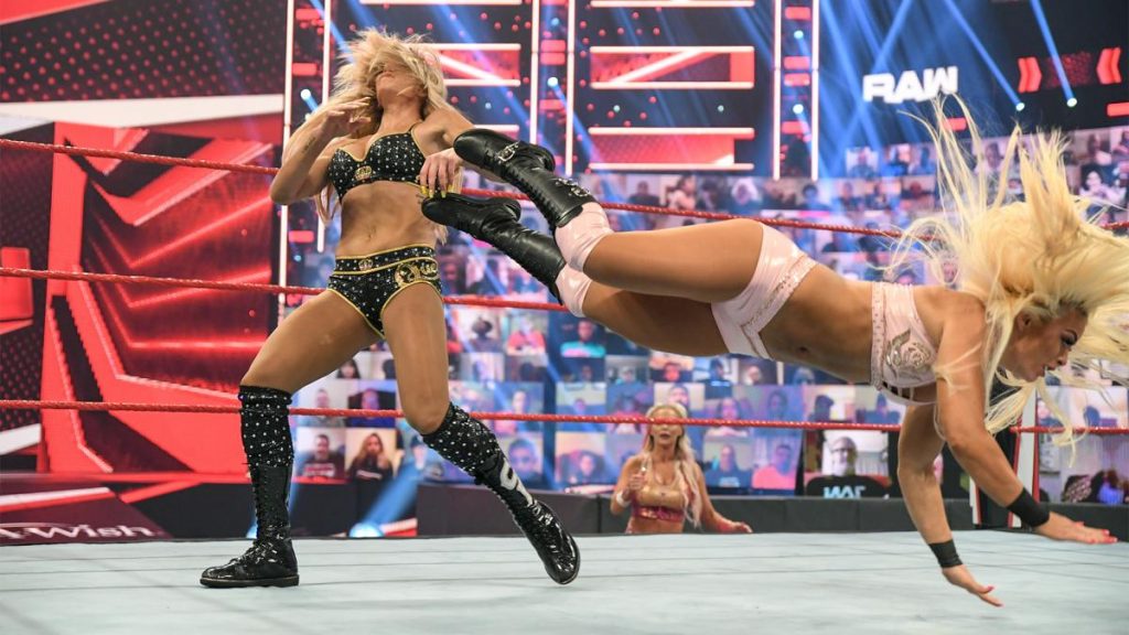 Mandy Rose dropkicks Charlotte Flair