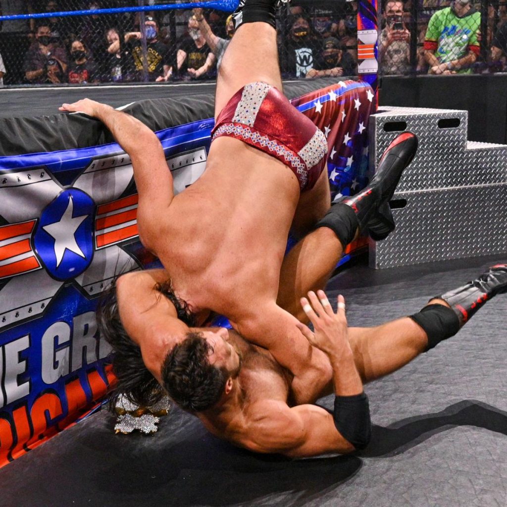 LA Knight DDTs Cameron Grimes on the Million Dollar Belt