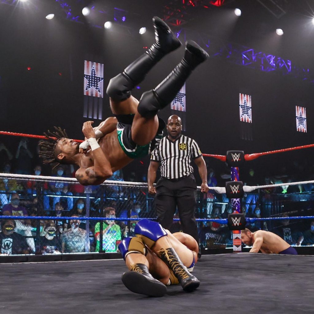 Wes Lee about to land on Tommaso Ciampa