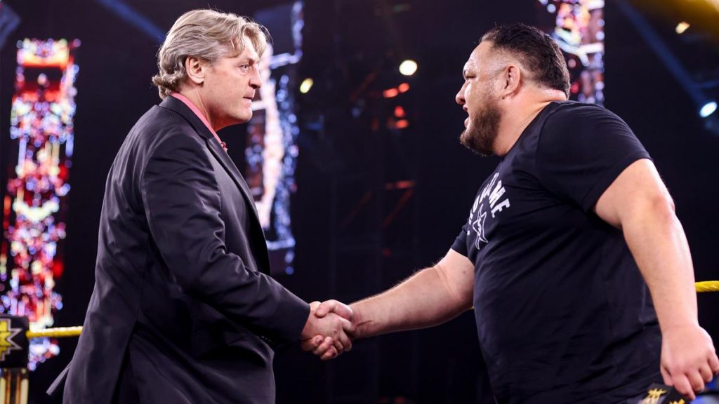 Samoa Joe and William Regal shake hands