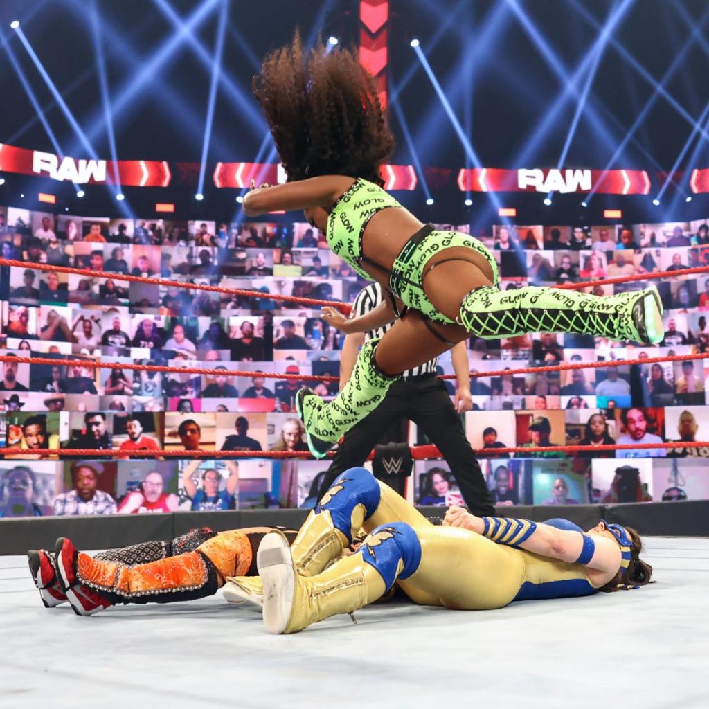 Naomi tries to pin Nikki A.S.H. and Asuka with the splits