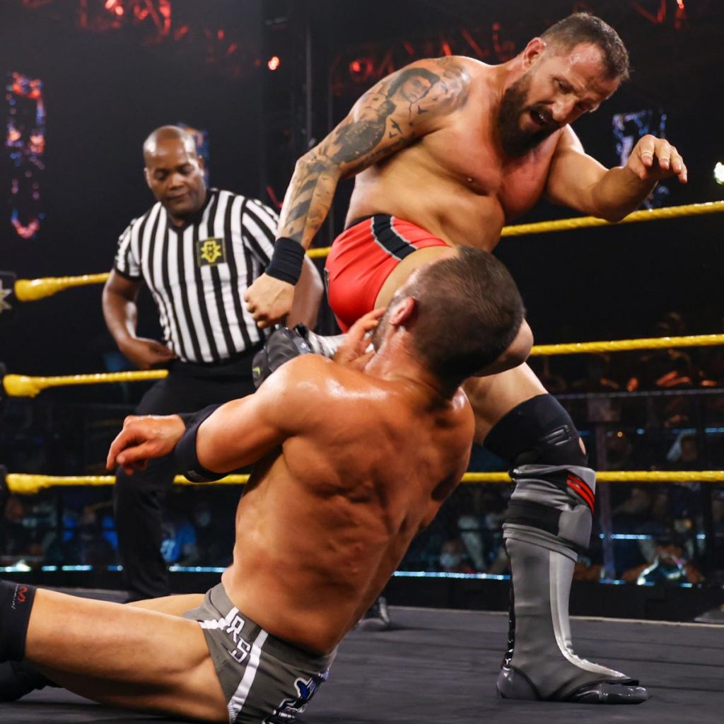 Bobby Fish kicks Roderick Strong in the chest