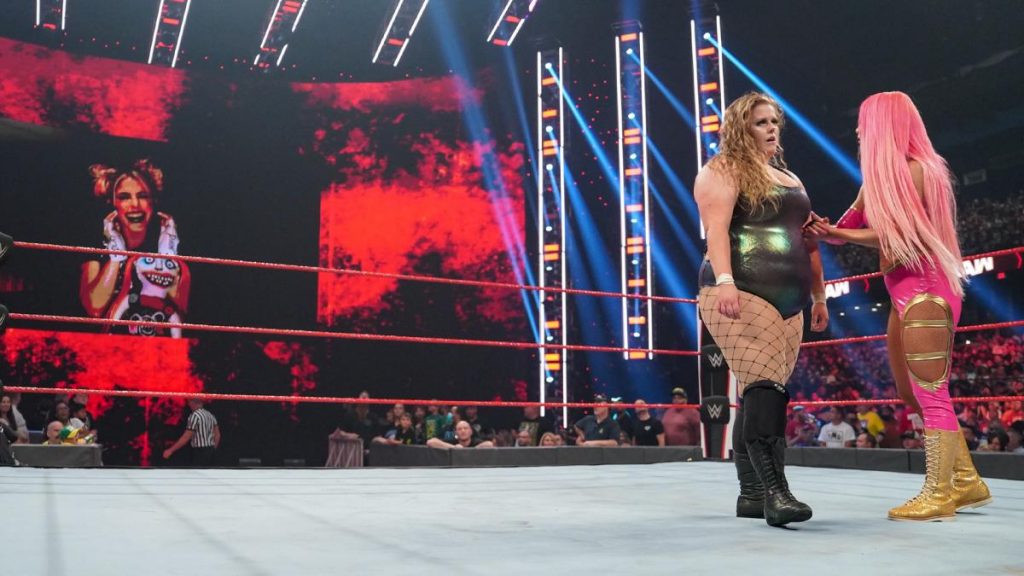 Alexa Bliss laughs at Eva Marie and Doudrop from the big screen