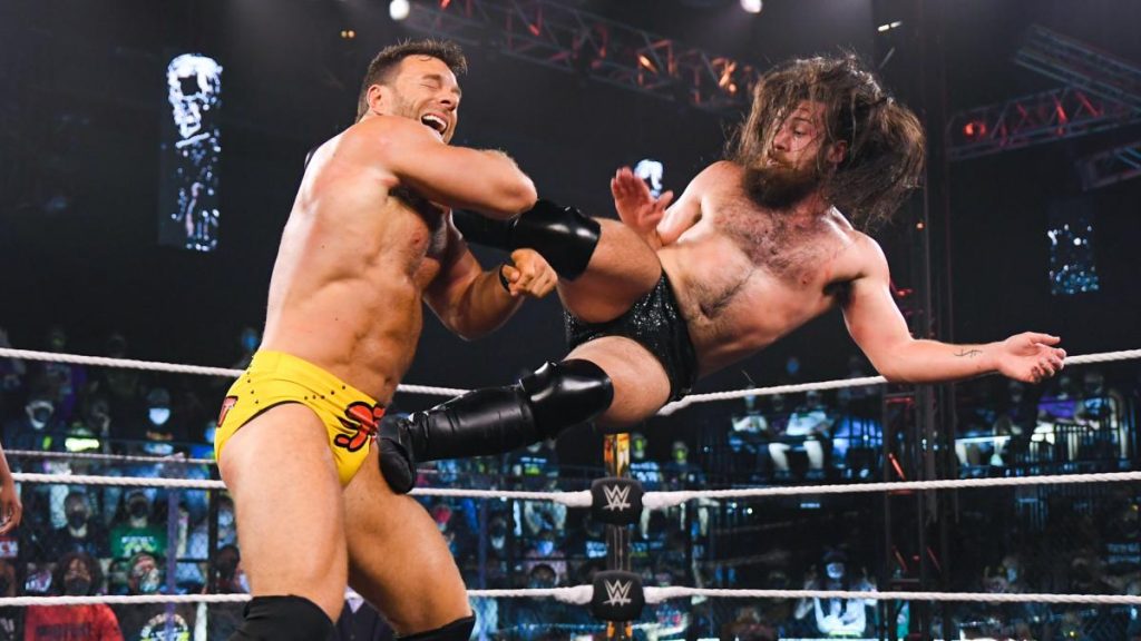 Cameron Grimes dropkicks LA Knight