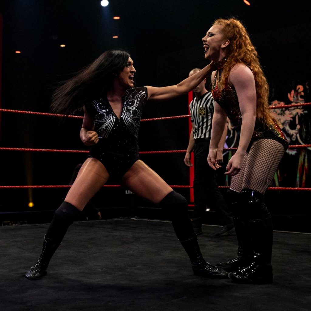 Jinny punches Isla Dawn while Dawn laughs