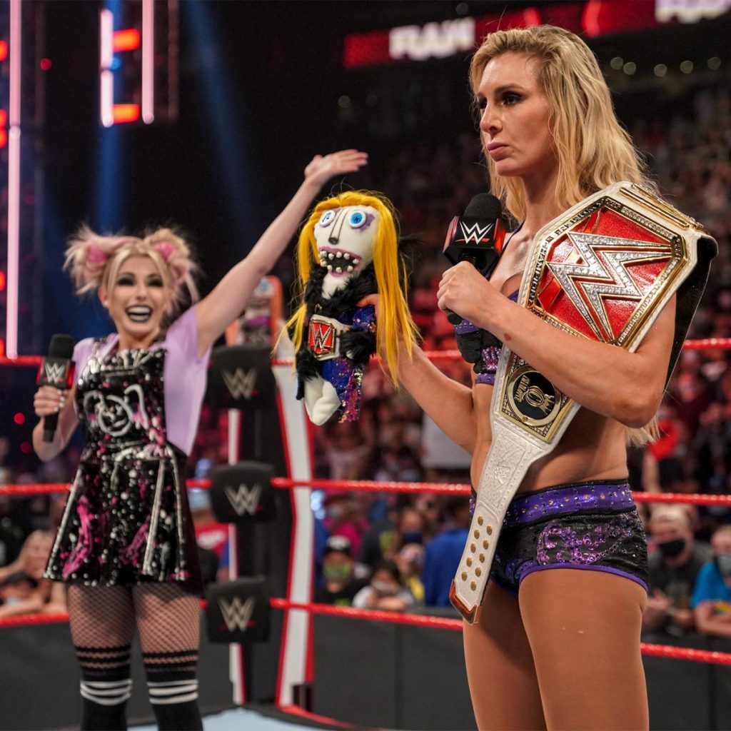 Alexa Bliss presents Charly to Charlotte Flair
