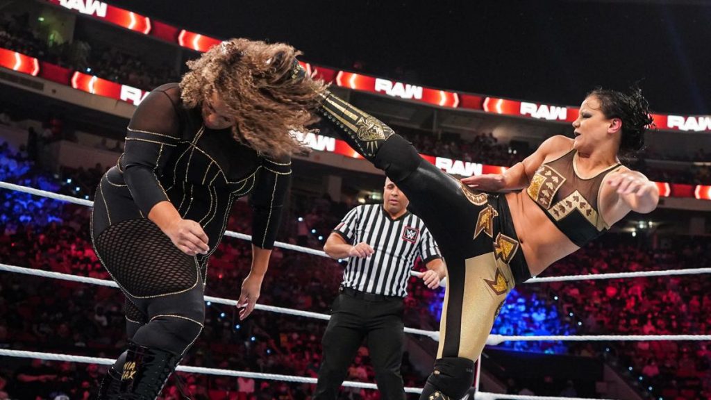 Shayna Baszler superkicks Nia Jax in the head