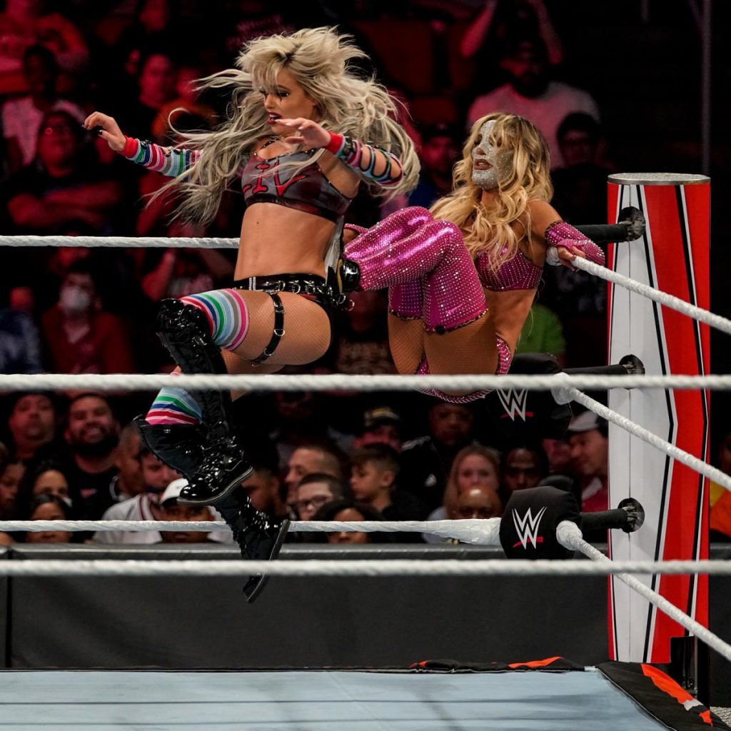 Carmella kicks Liv Morgan out of the corner