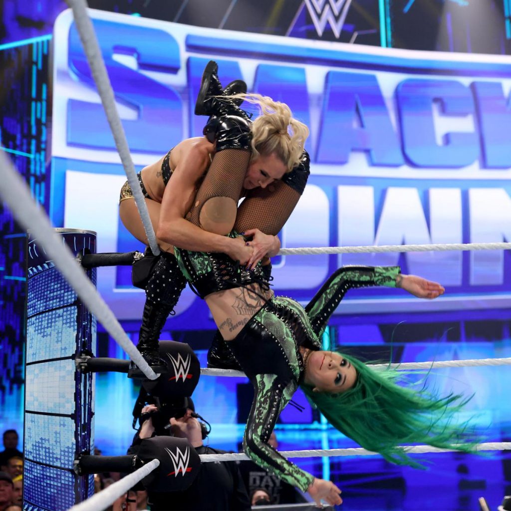 Shotzi brings Charlotte Flair down from the turnbuckle with a hurricanrana