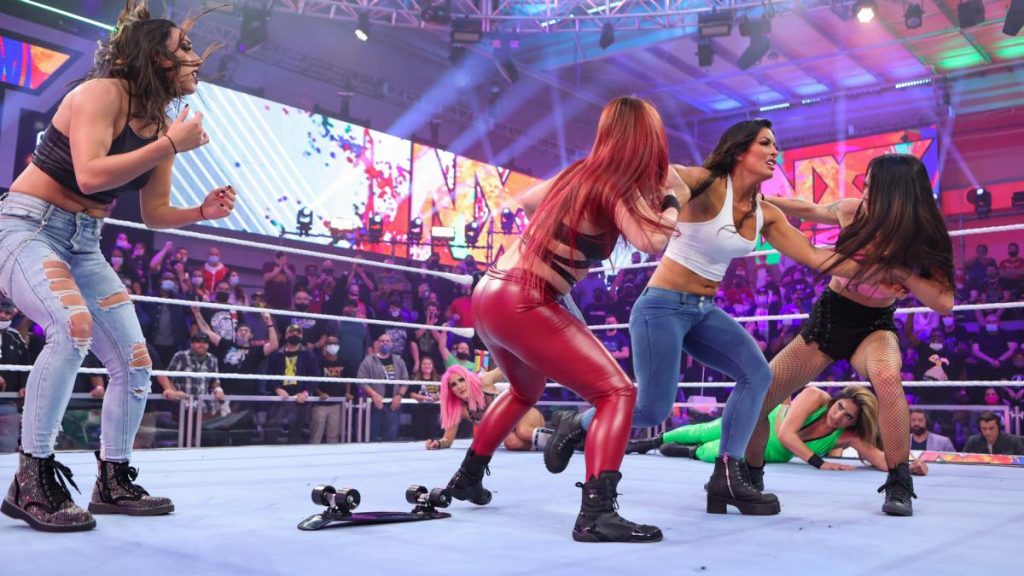 Io Shirai and Cora Jade take on Mandy Rose in the WarGames set up brawl