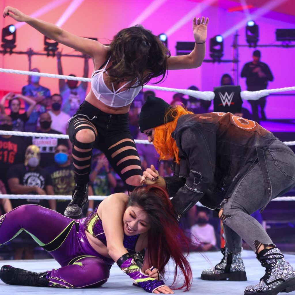 Gigi Dolin and Jacy Jayne stamp on Io Shirai