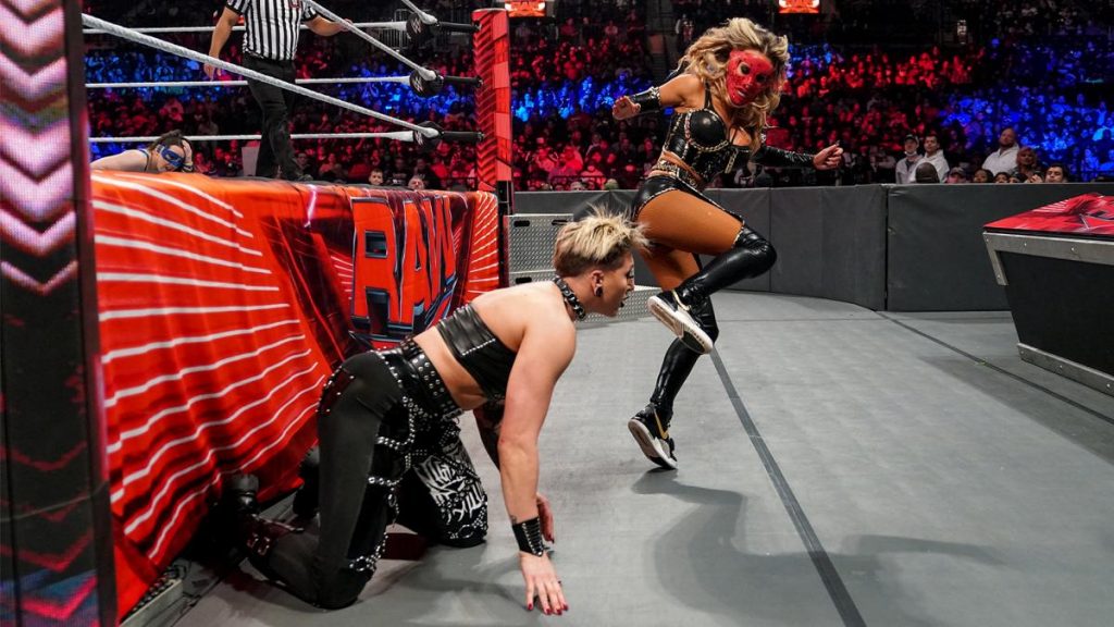 Carmella kicks Rhea Ripley in the face