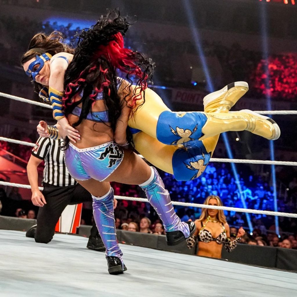 Nikki A.S.H. crossbody to Queen Zelina