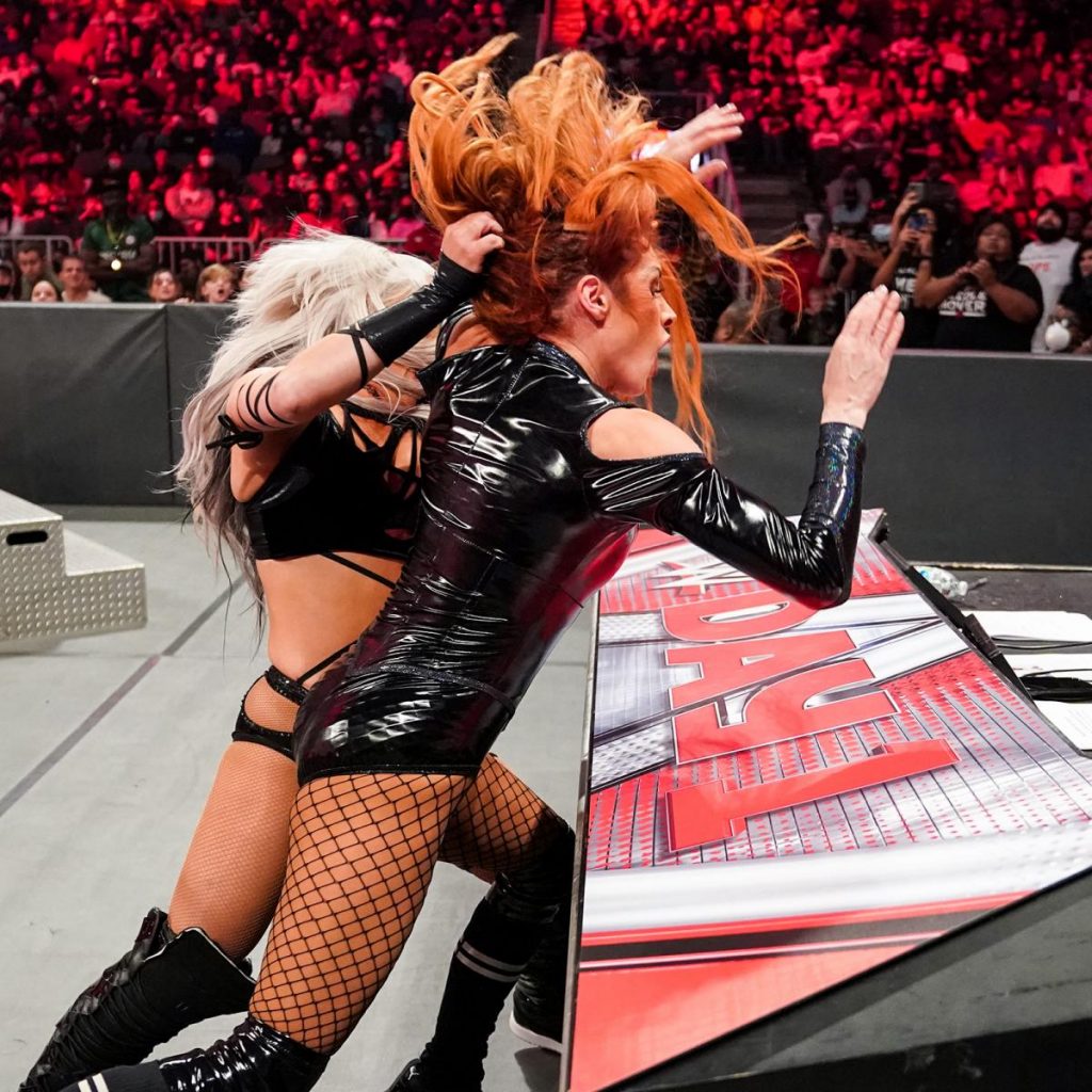 Liv Morgan smashes Becky Lynch's head into the announce desk