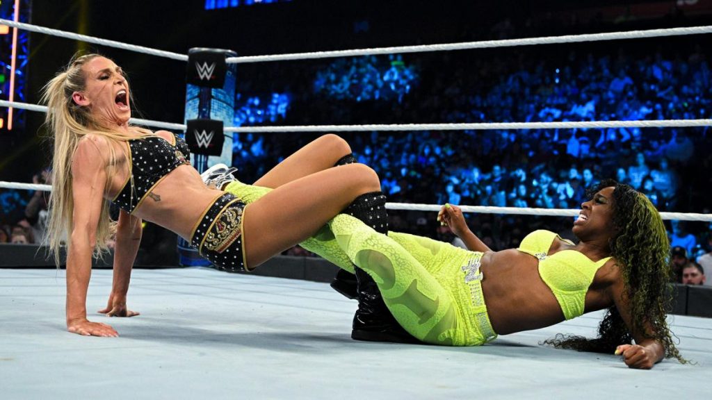 Charlotte Flair tries to submit Naomi