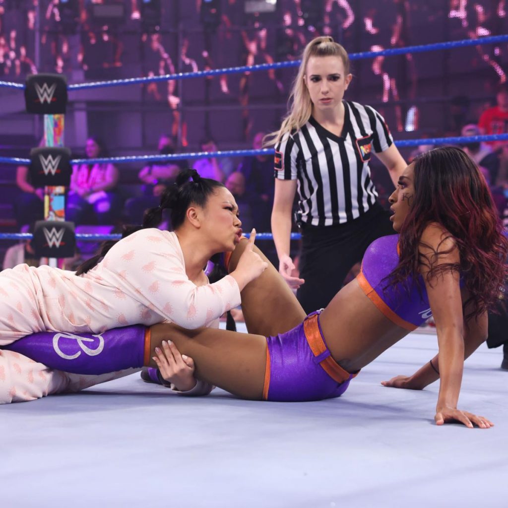 Wendy Choo tries for a mid-match nap on Amari Miller