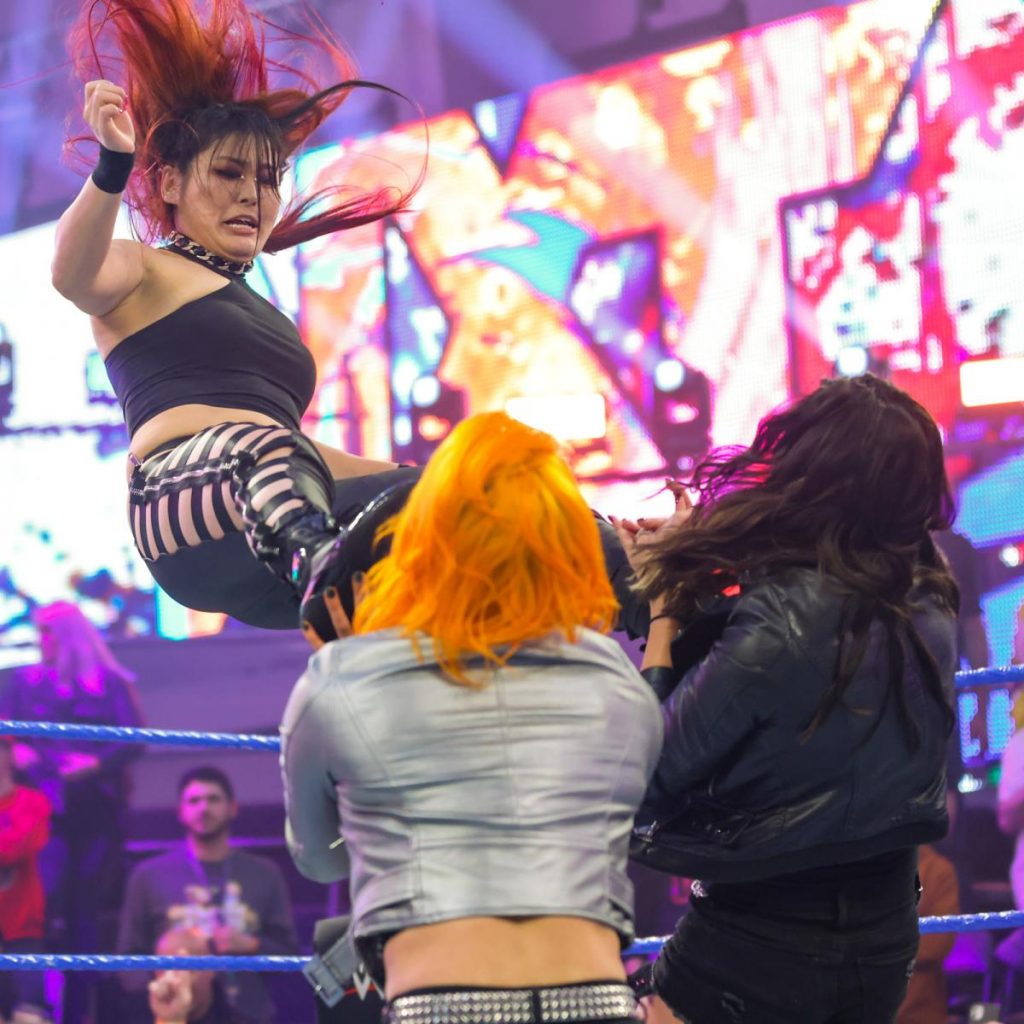 Io Shirai dropkicks Toxic Attraction