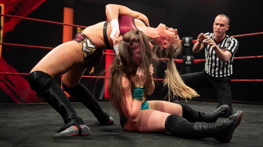 Emilia McKenzie controls Angel Hayze