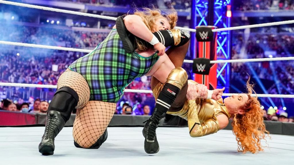 Becky Lynch takes down Doudrop with a head scissors