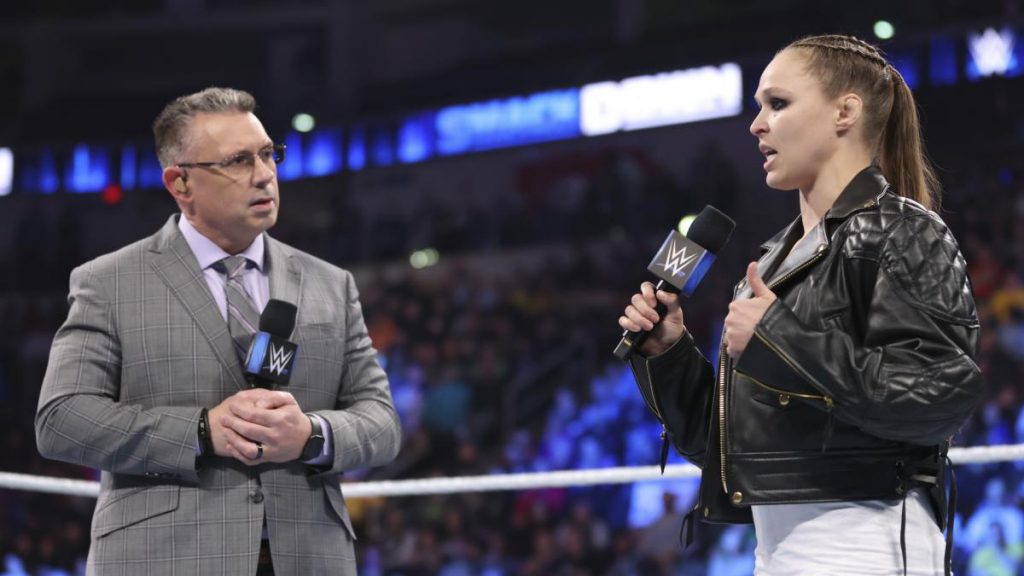 Michael Cole and Ronda Rousey